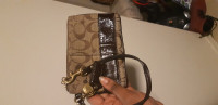 Coach wristlet/wallet price is firm