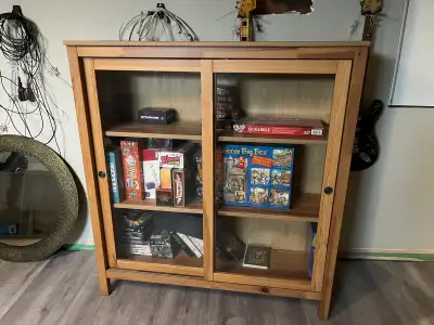 Wooden Ikea cabinet with sliding glass doors 