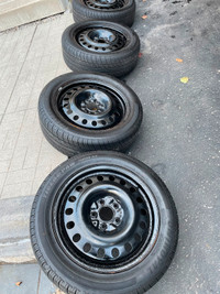 215/55/R17 Tires with steel Rims DOT 3522