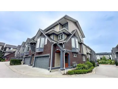 This stunning southeast-facing corner townhouse offers over 2,800 sq.ft. of upscale living space, fe...