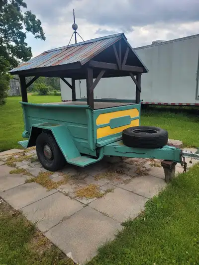 1956 Dodge box made into vegetable stand or wood. Stand contact (705) 730-9399 thank you.