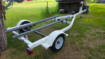 16ft boat trailer fresh paint LED lights new carpet on the bunks and new tongue jack. Will trade for...