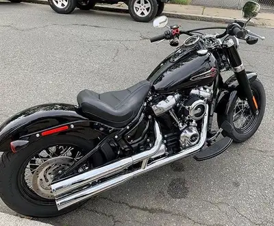 Upgrade your ride with this high-quality, pre-owned Mustang solo seat Harley-Davidson Softail Slim....