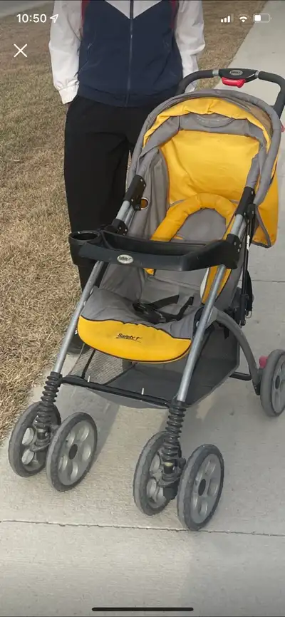 Yellow and grey colour baby stroller in good condition . Foldable