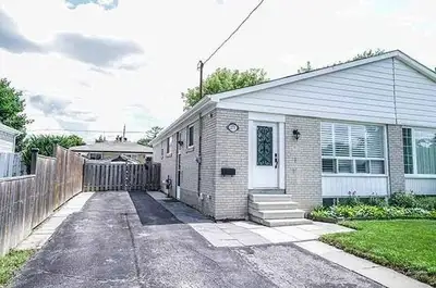A very clean three bedroom house with a spacious attic room and access to the backyard, close to hig...