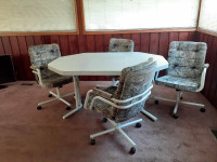 $175 casual dining set table and four chairs