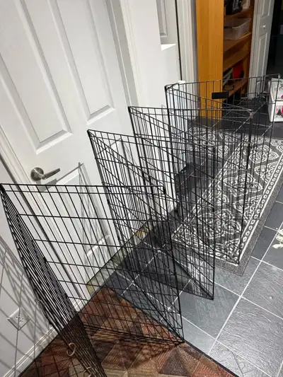 8-panel dog fence ,can be latched in a circle. EACH panel is 42 inches tall and 24 inches wide. Used...