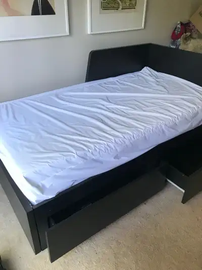 The IKEA Flekke Daybed is a 4-in-1 multi-functional daybed that allows for sitting, or a single bed,...