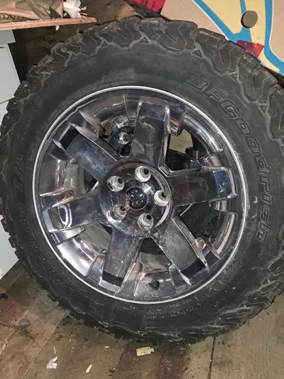 Selling a set of used BFGoodrich tires and rims, size LT275/65R20, perfect for all-terrain adventure...