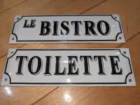 25$ for a pair of Made in Romania Le Bistro & Toilette door sign
