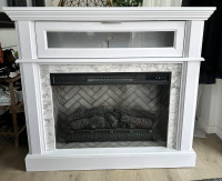 Fireplace T.V unit with matching glass door shelving stands