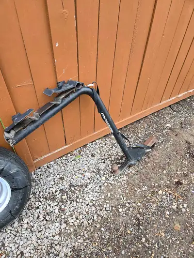 This bike Rack goes into your hitch and you can still use the ball hitch