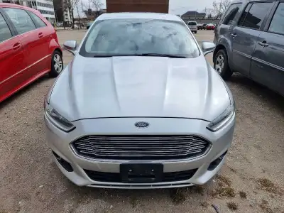 2013 Ford Fusion SE 1.6L Ecoboost in excellent condition. Fully loaded premium package with black fa...