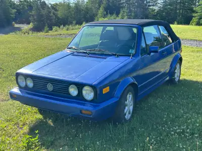 1991 VW Cabriolet, 1.8 automatic. Runs, drives, stops. Needs an alternator. Rust free. Has a small t...