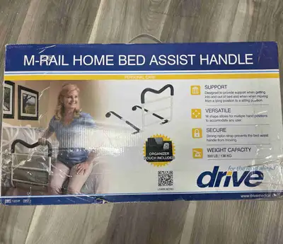 Two brand new Bed Assist Handles, still in their original boxes. I am selling two Drive Medical M-Ra...
