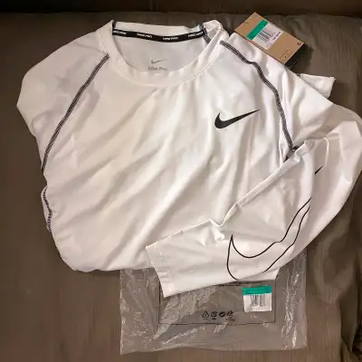 100% Authentic or your money back. Currently in stores. Got as a gift. Prefer short sleeve. Men's XL...