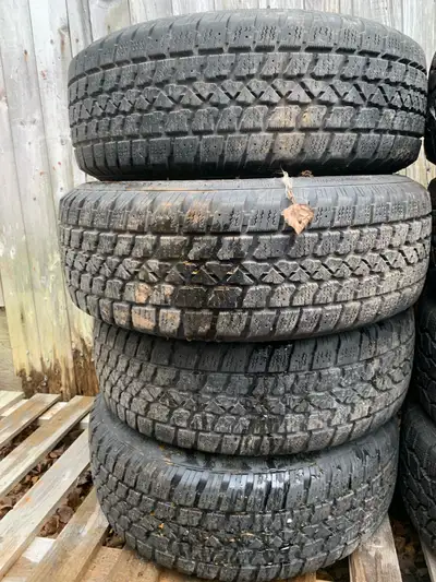 Set of 4 205-65-15 winter tires on Honda accord rims. Tires are in decent shape rims are rusty askin...