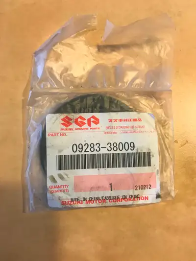 BRAND NEW Drive gear motorcycle parts. One Suzuki Oil Seal 09283-38009 (#12 on the diagram) $15. One...