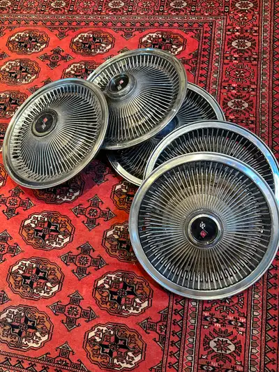 5 Original 1968 to 1974 turbine hubcaps No major dents or damage. Two caps are not in the best shape...