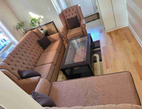 Well furnished sofa with table 