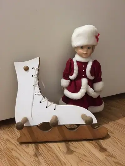 We are changing our winter decor and have to offer a sweet European skating doll with stand, and a w...