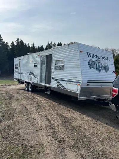 Big trailer one slide tows gd gd tires rims axles hitch crank chains etc propane electric and batter...