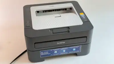 I'm selling a used Brother HL-2230 laser printer that's perfect for home or small office use, offeri...