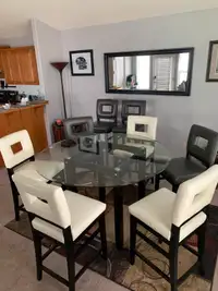 Glass top Dining room table and 8 chairs