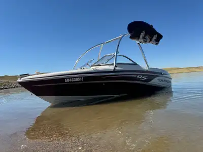 2014 Tahoe Q5i 19.5’ fish and ski package combines everyone’s interests. -Fishing package with Minn...