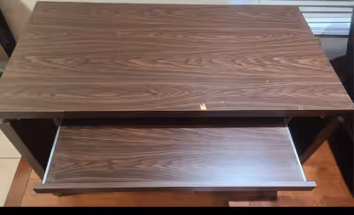 Computer Table used good with one small chip on the front, visible in the picture. Size is W-23.5",...