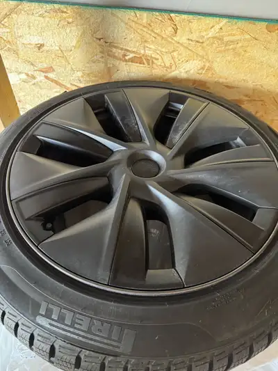 Model Y 19" Gemini Dark Wheel and Winter Tire Package provides maximum safety and grip when driving...