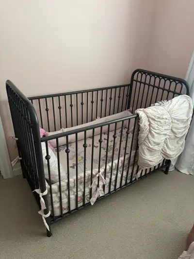 This stylish crib comes with a Newton baby mattress, offering a safe and comfortable sleeping space...