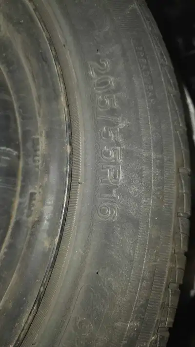 I'm selling a used all-season tire with a rim, size 205/55R16. It's a great spare or replacement opt...