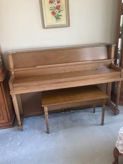 FREE upright piano. Original owner, in very good condition. 58" wide, 40" high. Canadian made.
