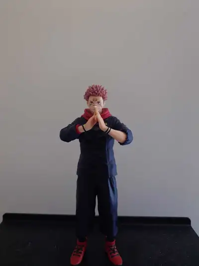 This Sukuna action figure from Jujutsu Kaisen is an authentic collectible standing at approximately...