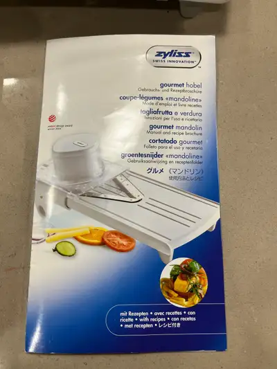 The Zyliss mandoline slicer is a versatile, compact kitchen tool designed for safe, precise slicing...