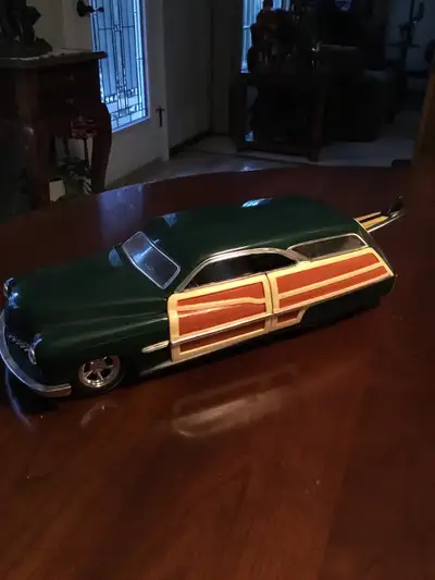 Pic 1&2……Rolls…SOLD Pic 3&4……$55 1:18 Woody Wagon with original surfboard Pic 5…………$50 1:18 Pic 6… …...