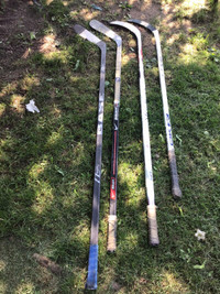 4 composite made adult hockey sticks-2 RH and 2 LH-each $10