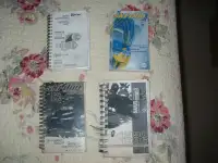 A  Four Book Lot  Of Ski-Doo Specification Booklets