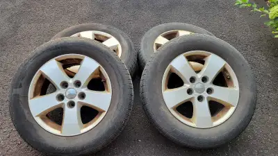225 65R 17 5 x 127mm bolt pattern Tires from a Dodge Journey. Tired are no more good, but the Rims a...