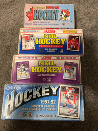 4-complete hockey card factory sets. 
