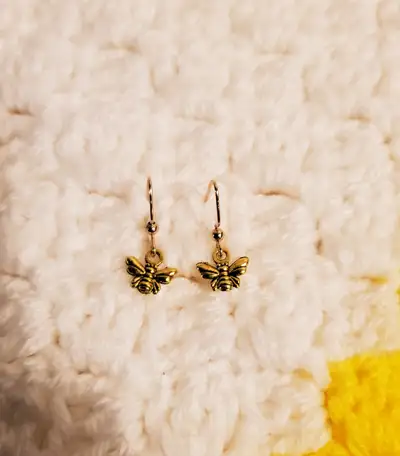Cute little gold tone honey bee earrings. Fishhook posts, nickel-free. Brand new, handmade. $5 a pai...