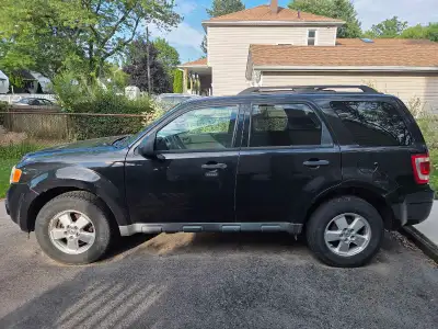 Ford Escape 2011 in good shape, all season tires, occasionally needs a jump to get started, 1 keyfob...