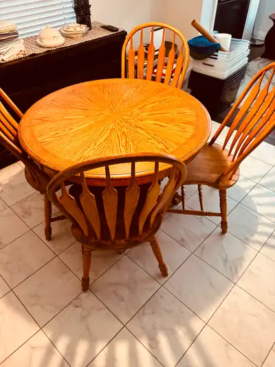 OAK DINING TABLE with CENTER LEAF & 4 MATCHING CHAIRS, View more