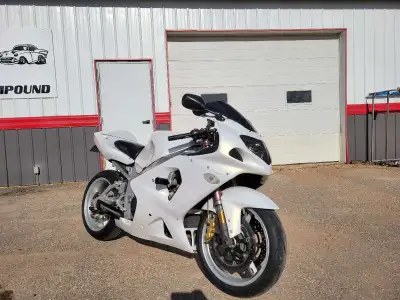Looking at selling or trading my 2001 suzuki gsxr 1000. This bike is in amazing shape and has had a...