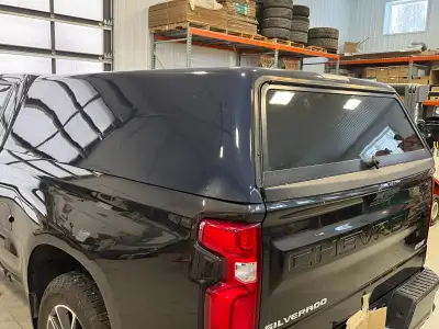 A.R.E. Truck Cap with solid sides. 6-6" length. Northsky Blue Metallic. Rear window. Excellent condi...