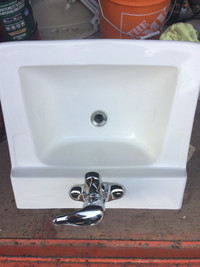 19 inch square bathroom sink with used drain and Moen faucet