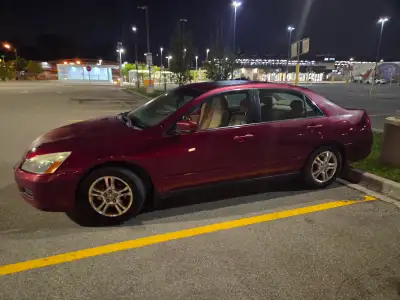 Well-maintained 2006 Honda Accord SE finished in Red with a Beige interior. This Accord has only 184...
