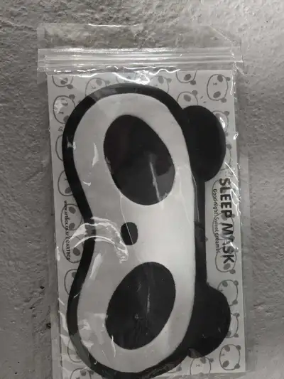 Get ready for a restful sleep with this cute Panda Sleep Mask. It's brand new and comes in its origi...