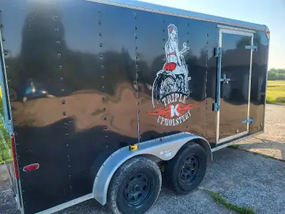 2008 7x14 enclosed motorcycle trailer. Tandem axle electric brakes. Side door. Rear ramp fold down....
